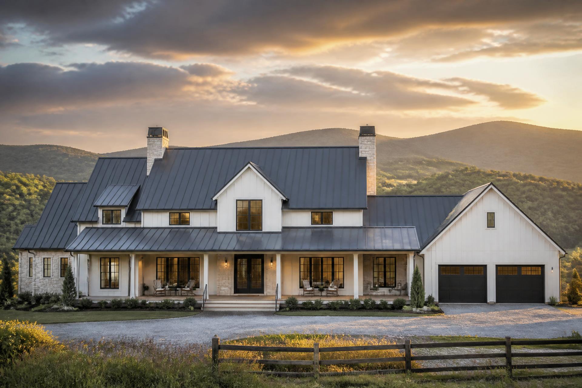 Modern Tennessee farmhouse with a dark standing seam metal roof at golden hour